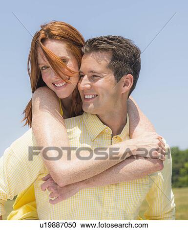 Portrait of couple smiling View Large Photo Image Stock Image - Portrait of couple smiling. Fotosearch