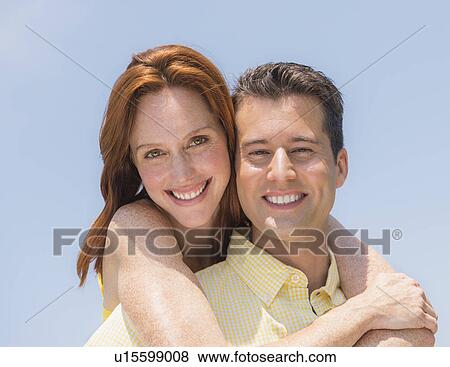 Portrait of couple smiling View Large Photo Image Stock Photo - Portrait of couple smiling. Fotosearch