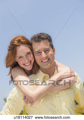 Portrait of couple smiling View Large Photo Image Stock Photo - Portrait of couple smiling. Fotosearch