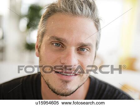Portrait of happy young man View Large Photo Image Stock Photography - Portrait of happy young man. Fotosearch