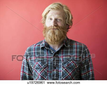 Portrait of smiling man with beard, studio shot View Large Photo Image Stock Image - Portrait of smiling man with beard, studio shot. Fotosearch