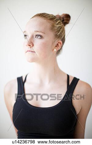 Portrait of teenage (16-17) gymnast exercising View Large Photo Image Stock Photo - Portrait of teenage (16-17) gymnast exercising. Fotosearch