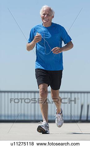 Stock Photo - Senior man jogging. Fotosearch