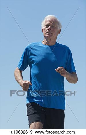 Stock Photo - Senior man jogging. Fotosearch