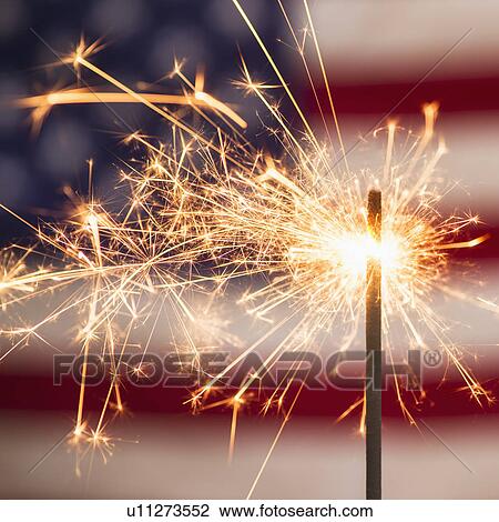 Sparkler and American flag View Large Photo Image Stock Image - Sparkler and American flag. Fotosearch