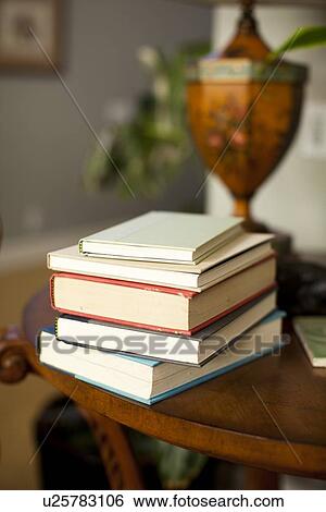 Stack of books on table View Large Photo Image Stock Photograph - Stack of books on table. Fotosearch