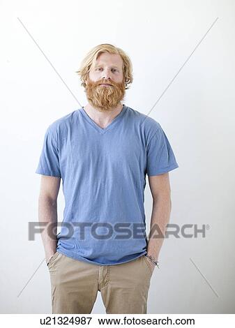 Studio portrait of man with beard View Large Photo Image Stock Photo - Studio portrait of man with beard. Fotosearch