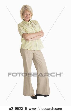 Studio portrait of mature woman View Large Photo Image Stock Photograph - Studio portrait of mature woman. Fotosearch