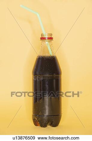 Studio shot of bottles of cola View Large Photo Image Stock Photo - Studio shot of bottles of cola. Fotosearch