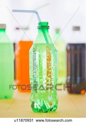 Stock Image - Studio shot of bottles with beverages. Fotosearch