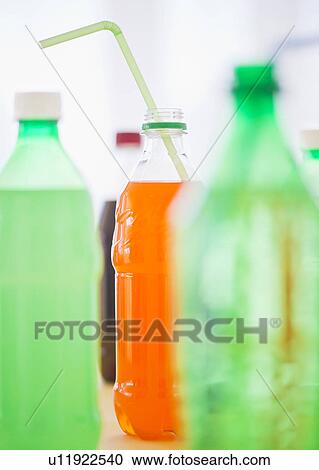 Stock Image - Studio shot of bottles with beverages. Fotosearch