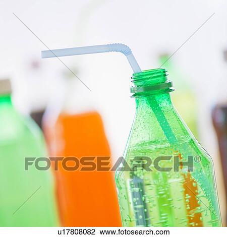 Studio shot of bottles with beverages View Large Photo Image Stock Image - Studio shot of bottles with beverages. Fotosearch