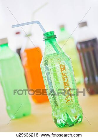 Studio shot of bottles with beverages View Large Photo Image Stock Photograph - Studio shot of bottles with beverages. Fotosearch