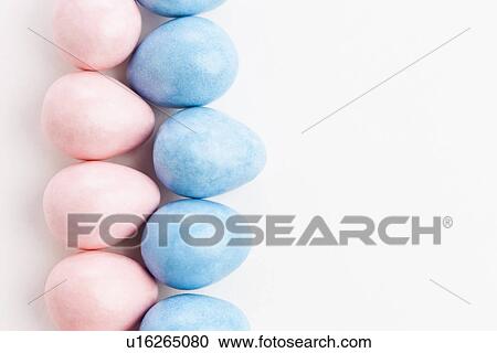 Stock Image - Studio shot of colorful eggs. Fotosearch