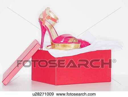 Studio shot of dress shoe in pink shoe box View Large Photo Image Stock Photo - Studio shot of dress shoe in pink shoe box. Fotosearch
