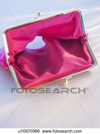 Studio shot of empty pink purse View Large Photo Image Stock Photograph - Studio shot of empty pink purse. Fotosearch