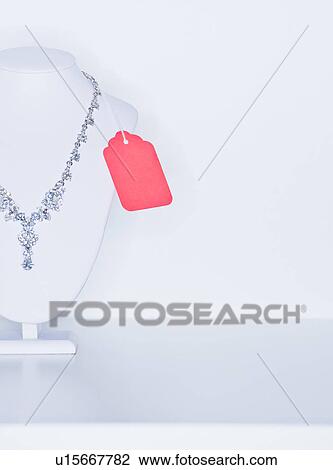Studio shot of necklace on jewelry stands View Large Photo Image Stock Image - Studio shot of necklace on jewelry stands. Fotosearch