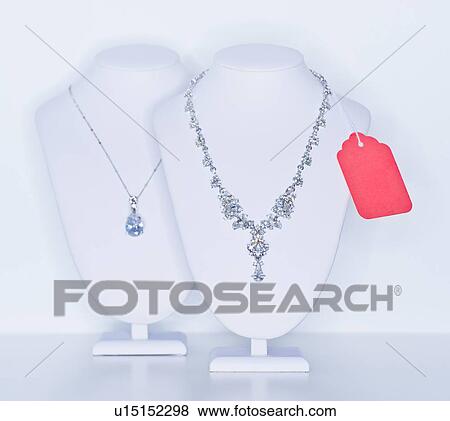 Studio shot of necklaces on jewelry stands View Large Photo Image Stock Photo - Studio shot of necklaces on jewelry stands. Fotosearch
