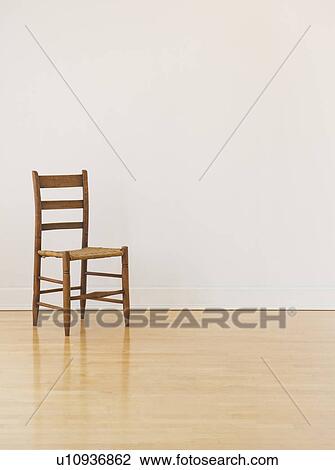 Stock Image - Studio shot of old chair. Fotosearch