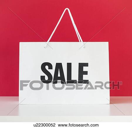 Stock Image - Studio shot of shopping bag. Fotosearch