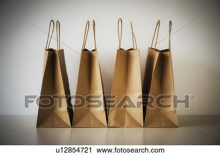 Stock Image - Studio shot of shopping bags. Fotosearch