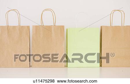 Stock Photo - Studio shot of shopping bags. Fotosearch