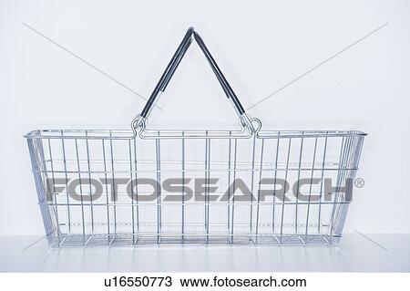 Studio shot of shopping basket View Large Photo Image Stock Image - Studio shot of shopping basket. Fotosearch