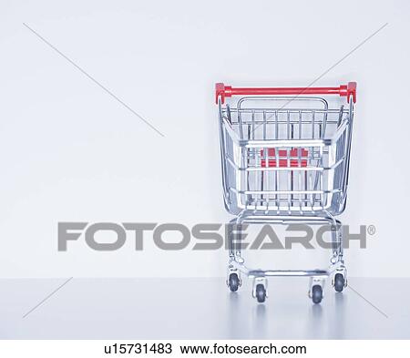 Studio shot of shopping cart View Large Photo Image Stock Image - Studio shot of shopping cart. Fotosearch