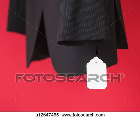 Studio shot of suit with price tag View Large Photo Image Stock Photography - Studio shot of suit with price tag. Fotosearch