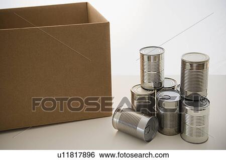 Tin cans and cardboard box View Large Photo Image Stock Photograph - Tin cans and cardboard box. Fotosearch