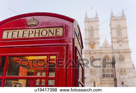UK, London, Phone booth with Westminster Abbey behind View Large Photo Image Stock Photo - UK, London, Phone booth with Westminster Abbey behind. Fotosearch