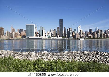 USA, New York City, Skyline against blue sky View Large Photo Image Stock Photography - USA, New York City, Skyline against blue sky. Fotosearch