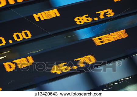 Stock Image - USA, New York State, New York City, Digital trading board. Fotosearch
