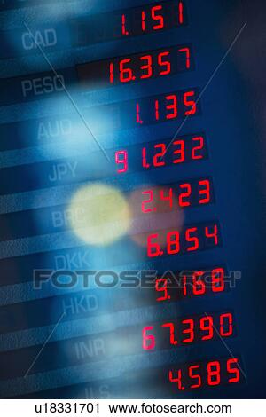 Stock Image - USA, New York State, New York City, Digital trading board. Fotosearch