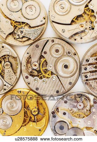 Variety of watches striped to parts View Large Photo Image Stock Photo - Variety of watches striped to parts. Fotosearch