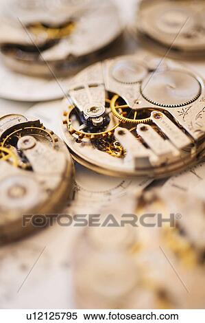 Variety of watches striped to parts View Large Photo Image Stock Photography - Variety of watches striped to parts. Fotosearch