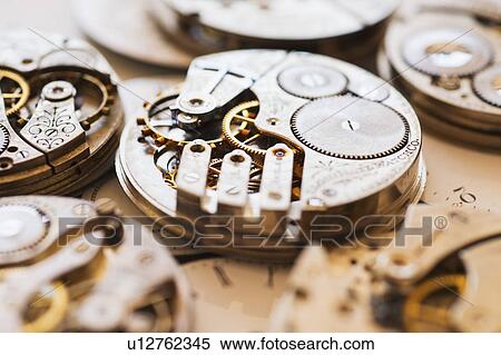 Variety of watches striped to parts View Large Photo Image Stock Photography - Variety of watches striped to parts. Fotosearch