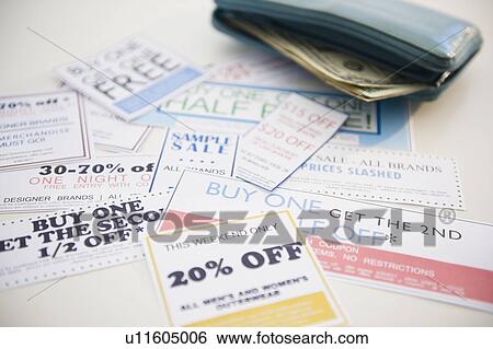 Wallet and discount offer leaflets View Large Photo Image Stock Photograph - Wallet and discount offer leaflets. Fotosearch
