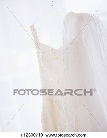 Wedding dress with veil View Large Photo Image Stock Image - Wedding dress with veil. Fotosearch