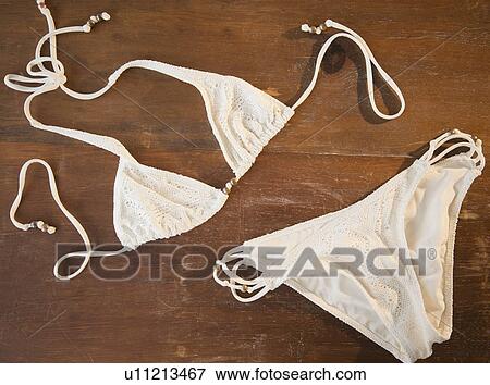 Stock Photo - White bikini on table. Fotosearch