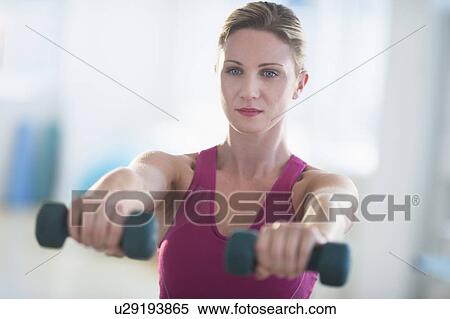 Stock Photography - Woman exercising. Fotosearch