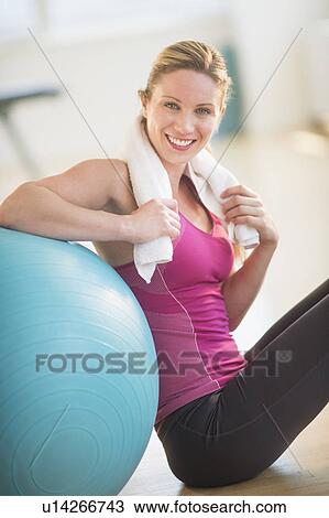 Woman in gym View Large Photo Image Stock Image - Woman in gym. Fotosearch