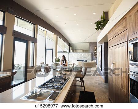 Woman in home interior View Large Photo Image Stock Photo - Woman in home interior. Fotosearch