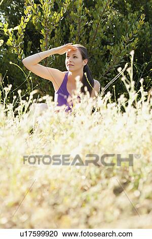 Woman taking break in run View Large Photo Image Stock Image - Woman taking break in run. Fotosearch