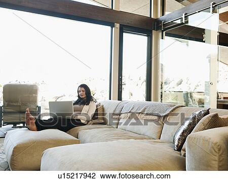 Woman working from home View Large Photo Image Stock Image - Woman working from home. Fotosearch