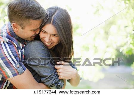 Young couple embracing View Large Photo Image Picture - Young couple embracing. Fotosearch