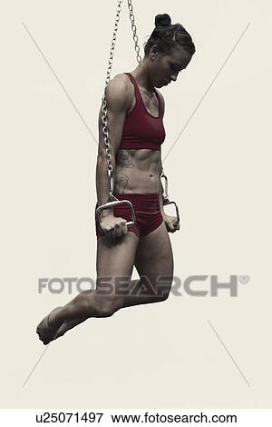 Young woman during abs training View Large Photo Image Stock Photo - Young woman during abs training. Fotosearch