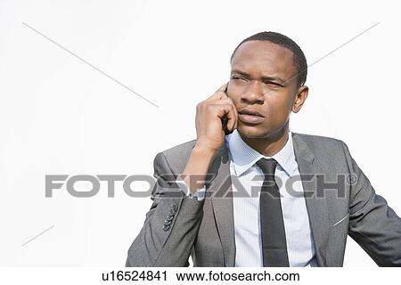 African American businessman on a call over white background View Large Photo Image Stock Image - African American businessman on a call over white background. Fotosearch