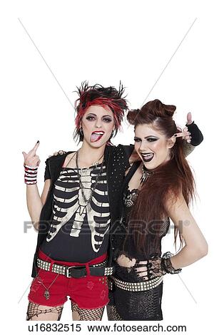 Arrogant punk females showing middle finger over white background View Large Photo Image Stock Photography - Arrogant punk females showing middle finger over white background. Fotosearch