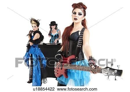 Stock Image - Beautiful all female rock band over white background. Fotosearch
